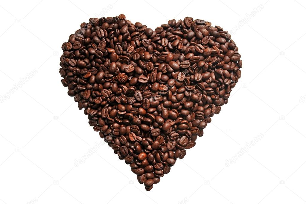 Coffee grains in the shape of a heart on a white background