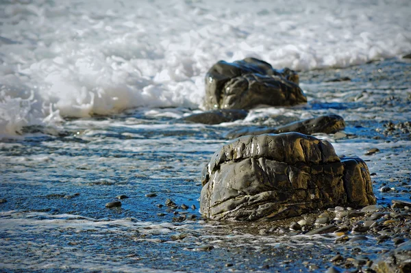 Piedras de mar lisas en la playa — Foto de Stock