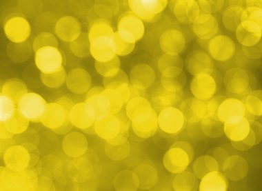 Yaprak üzerinde damlacıklar gelen sarı Bokeh etkisi