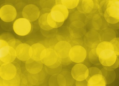 Yaprak üzerinde damlacıklar işleminden sarı büyük Bokeh etkisi