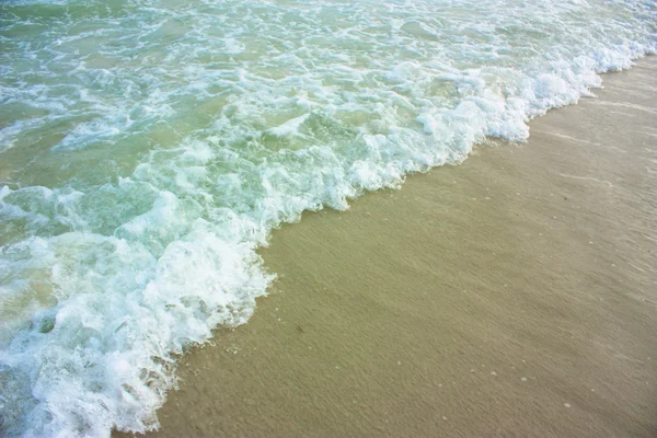 Våg på stranden — Stockfoto