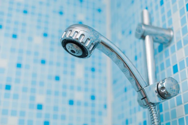 stock image Head shower on blue background