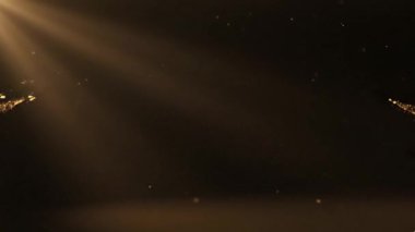 Parlayan altın yüzük soyut ışık parçacıkları ve duman fişeklerinden cisimlenir. Lüks tanıtımlar veya kutlama görsel duyuruları için mükemmel bir büyülü etki yaratır..