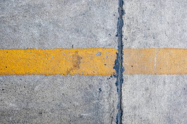 Beton zeminde sarı çizgiler, doku arkaplan biçimi