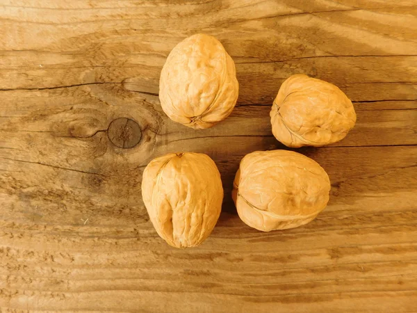 nuts to eat on wooden base