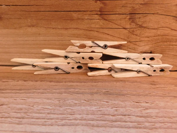 Pegs in the kitchen on a wooden base — Stock Photo, Image