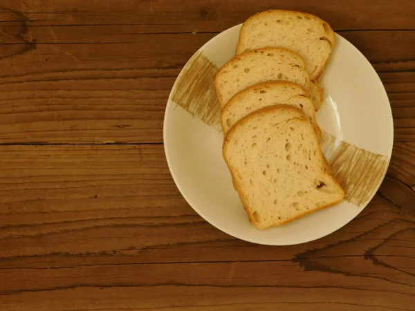 Bröd på träbotten — Stockfoto