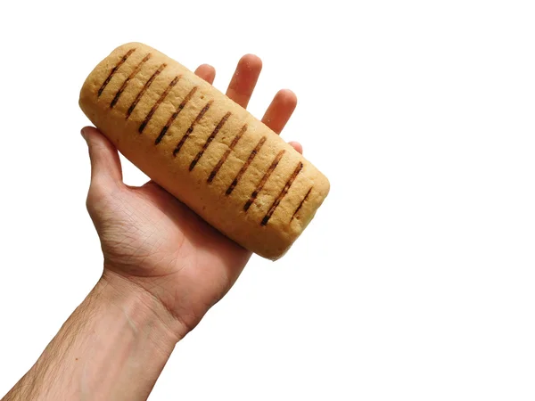 Hand mit Brot auf weißem Hintergrund — Stockfoto
