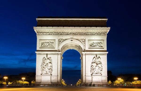 O Arco do Triunfo à noite, Paris, França . — Fotografia de Stock
