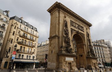 Porte Saint-Denis is a Parisian monument located in the 10th arrondissement, at the crossing of the Rue Saint-Denis continued by the Rue du Faubourg Saint-Denis. Paris. France.