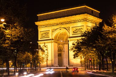 The Triumphal Arch at night , Paris, France. clipart