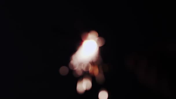 Sparkler on black background — Stock Video