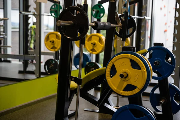Fitness benches in the weights at the gym