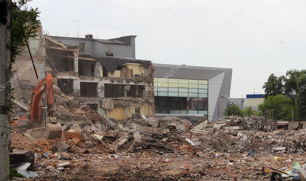 Demolition of buildings in urban environments. House in ruins.