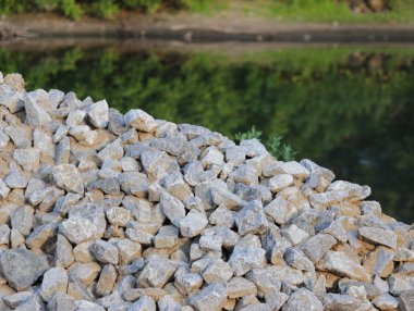 Washed gravel used at the construction site for the  of road transport interchanges in Moscow clipart