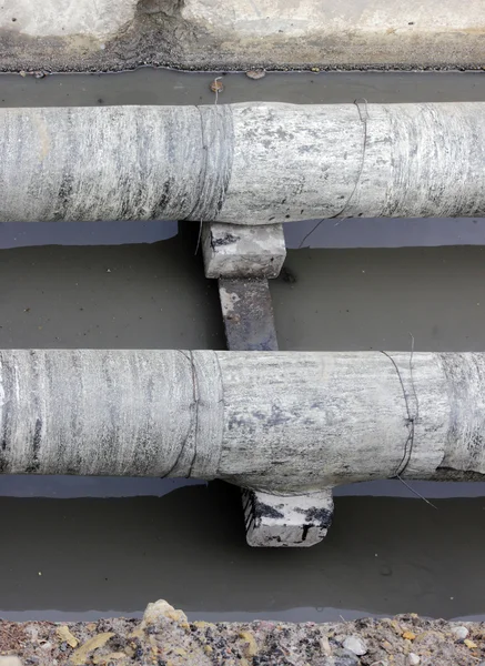 Water Pipes Insulated Roofing Sheets Repair Ditch Filled Muddy Water — 스톡 사진