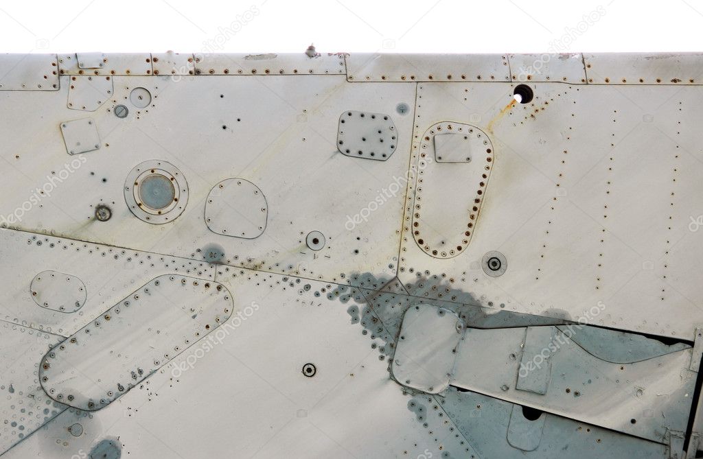 Isolated aircraft metal surface with aluminum and rivets.