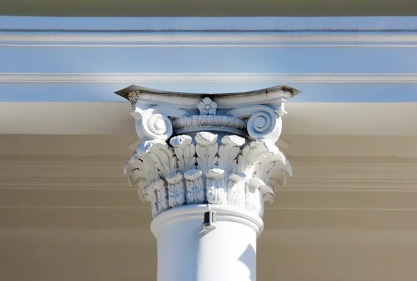 white columns in the Baroque style in a bright sunny day