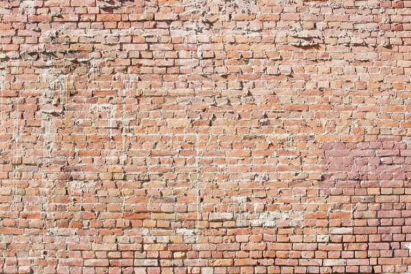 red brick and plaster on the old wall texture background