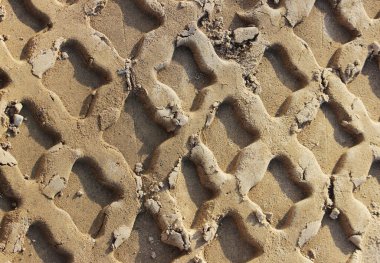 Kumda ağır inşaat malzemesi izleri var. Güzel doku, yakın plan..