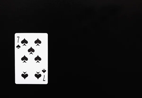 Playing card. playing card seven peak on a black background — Stock Photo, Image