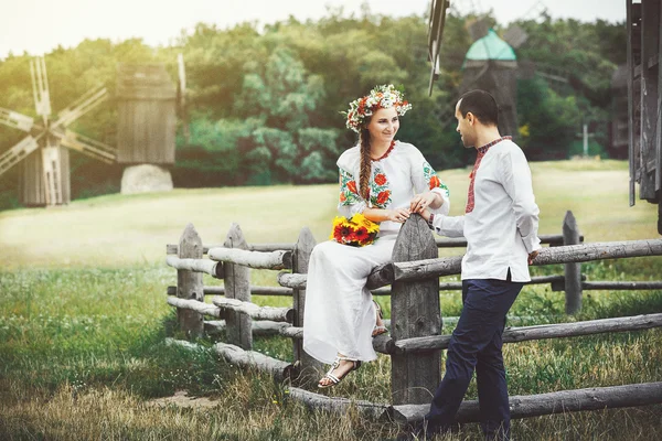 Young Ukrainian couple in traditional clothes — Stock Photo, Image