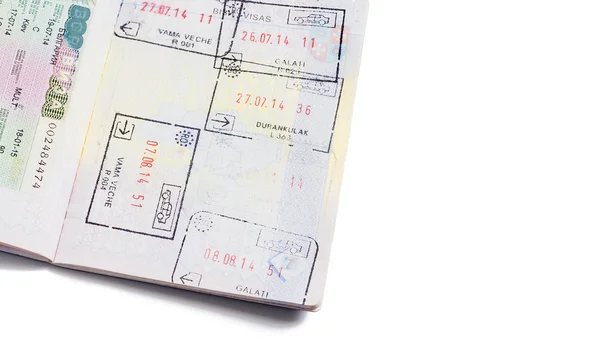 A passport with pages with visas and stamps — ストック写真