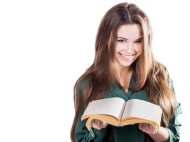 young girl smiling, opened the book to isolate. Is reading.