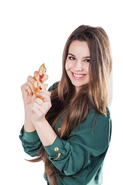 Attractive brunette woman eating a croissant on isolated background. — Φωτογραφία Αρχείου