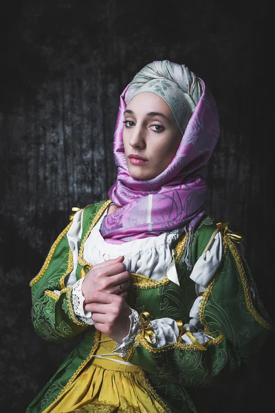 Medieval woman holding hands in prayer — Stock Photo, Image