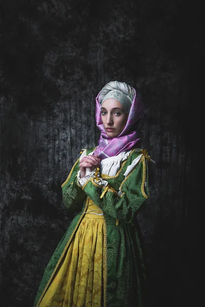 Medieval woman holding hands in prayer — Stock Photo, Image