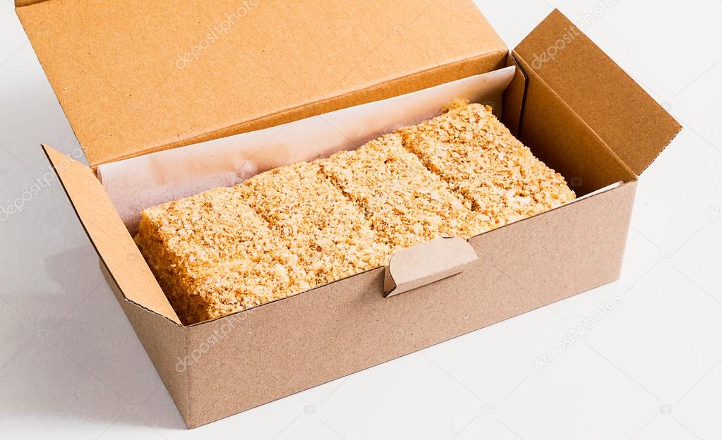 napoleon cake pieces in a cardboard box