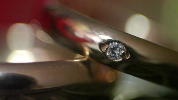 Diamond rings in light close-up — Stock Video