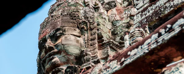 Head encarved in stone Bayon temple Angkor — Stock Photo, Image