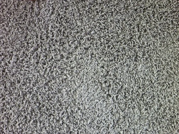 Texture of a simple grey carpet — Stock Photo, Image