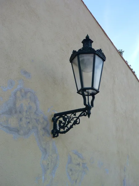 historical decorative lamp on an old wall