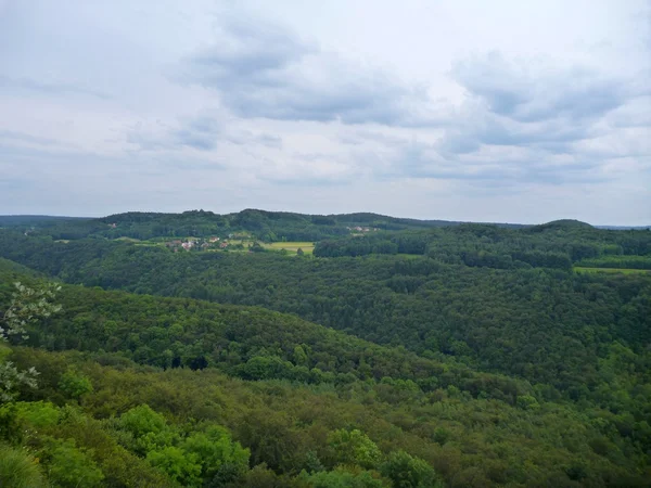 View on a green landstape from the top of a rock — Stock Photo, Image