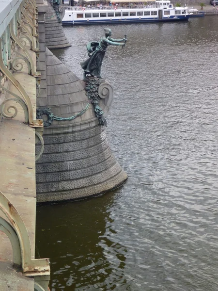 metal statue on an old bridge in prague
