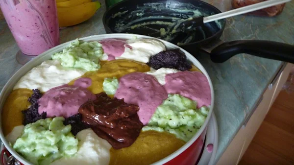 preparation of a non traditional colorful cake