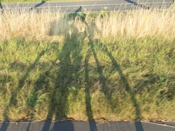 Sombra Motociclista Com Bicicleta Estrada — Fotografia de Stock