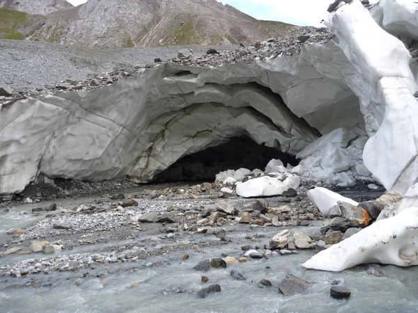 Cave in the white ice of the glacier — Stock Photo, Image