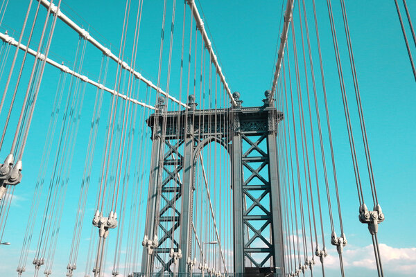 MANHATTAN BRIDGE ON A CLEAR BLUE DAY