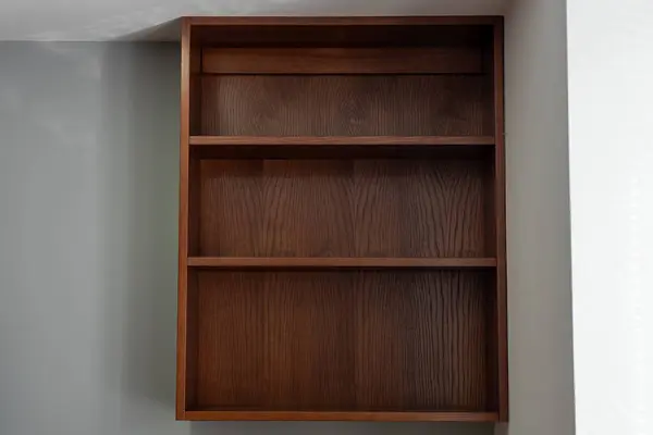 Volumetric wooden shelf on the wall. For kitchen, room, living room.