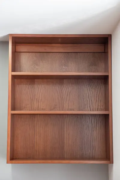 Volumetric wooden shelf on the wall. For kitchen, room, living room.