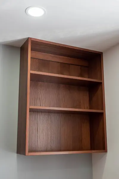Volumetric wooden shelf on the wall. For kitchen, room, living room.