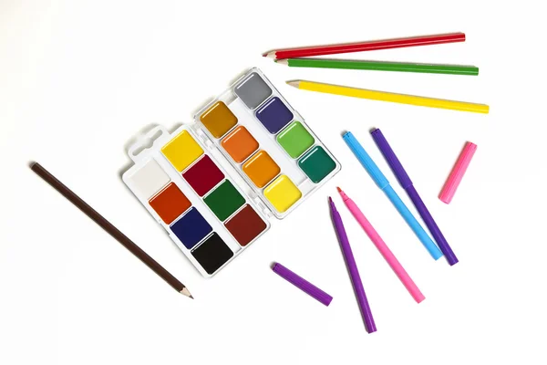 Watercolors, pencils and markers isolated on white background Royalty Free Stock Images