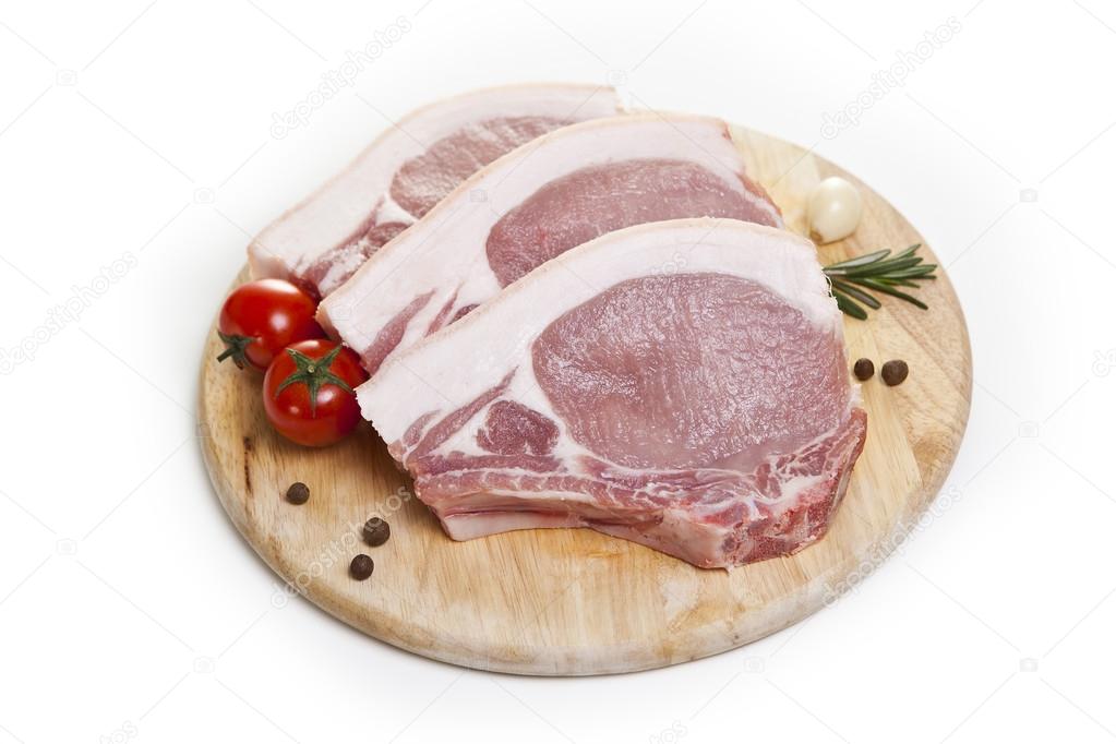 Raw pork loin isolated on white background