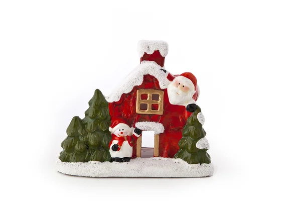 Kerst huis beeldje op een witte achtergrond — Stockfoto