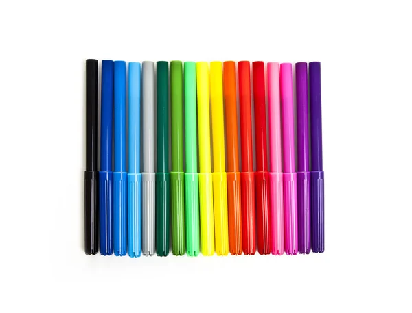 Multicolored markers on a white background top view — Stock Photo, Image