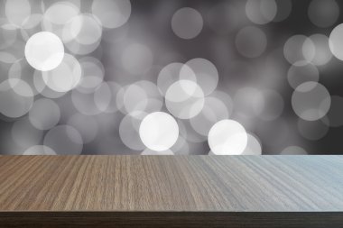 Soyut bokeh arka plan üzerinde ahşap tablosunun üst kısmındaki